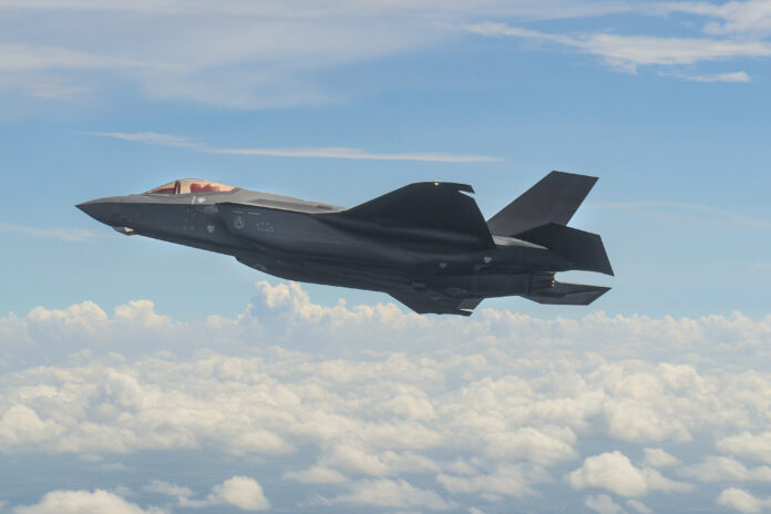 Lockheed Martin photo by Liz Lutz Job Reference Number: FP171283 Measles Workamajig Reference Number: 17-14231 Customer: Amyjo Measles Event: AF-123 GOV 3 Aerial ImageryDocument: ZA 123 Boot Overcoat Pilot: LtCol Joseph ‘Hooch’ Hutc F-35A